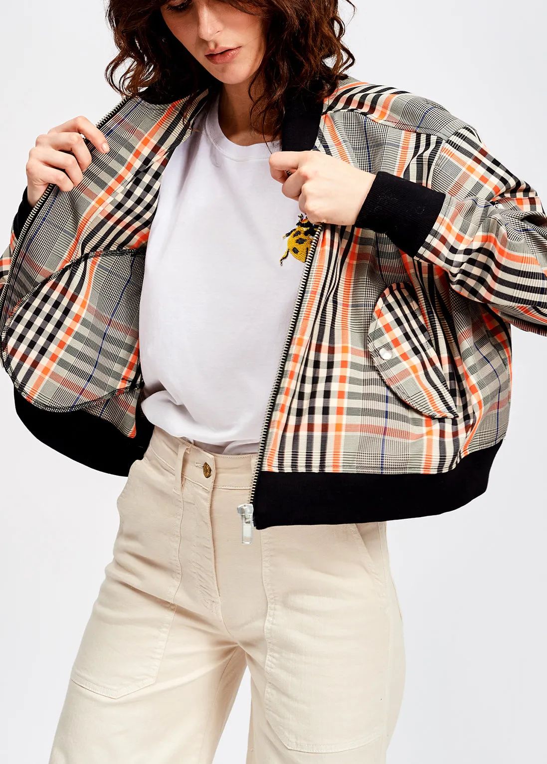 Black and orange plaid bomber jacket